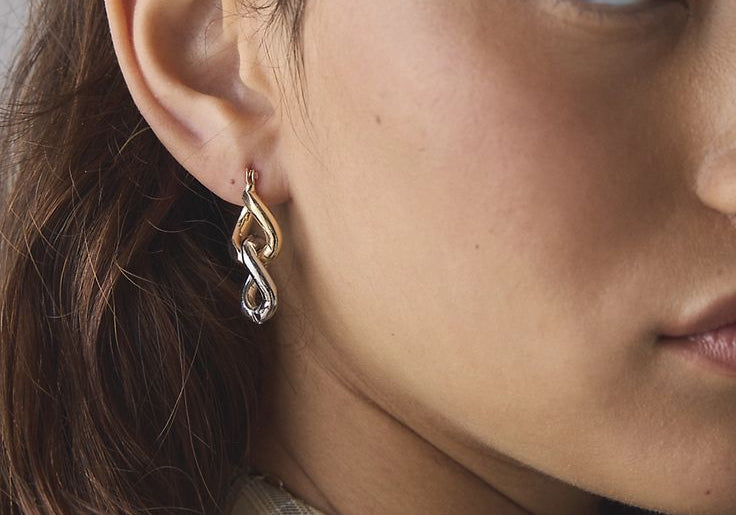 Why Your Ears Hurt — and Why Titanium Changes Everything - Elysia