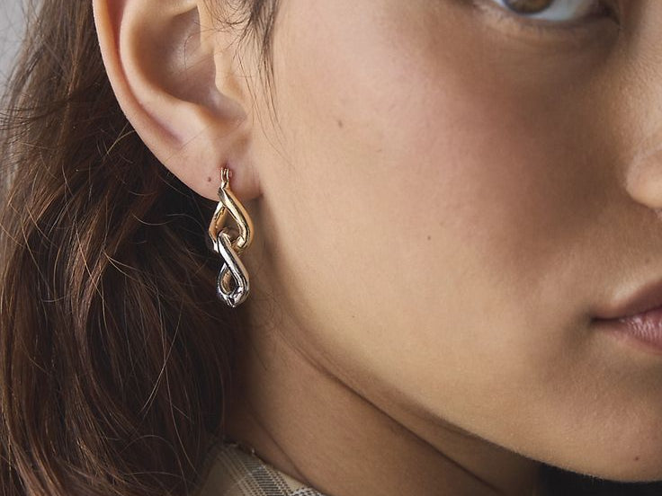 Why Your Ears Hurt — and Why Titanium Changes Everything - Elysia