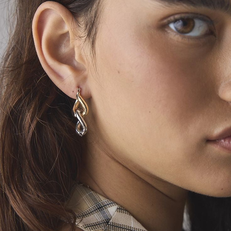 Why Your Ears Hurt — and Why Titanium Changes Everything - Elysia