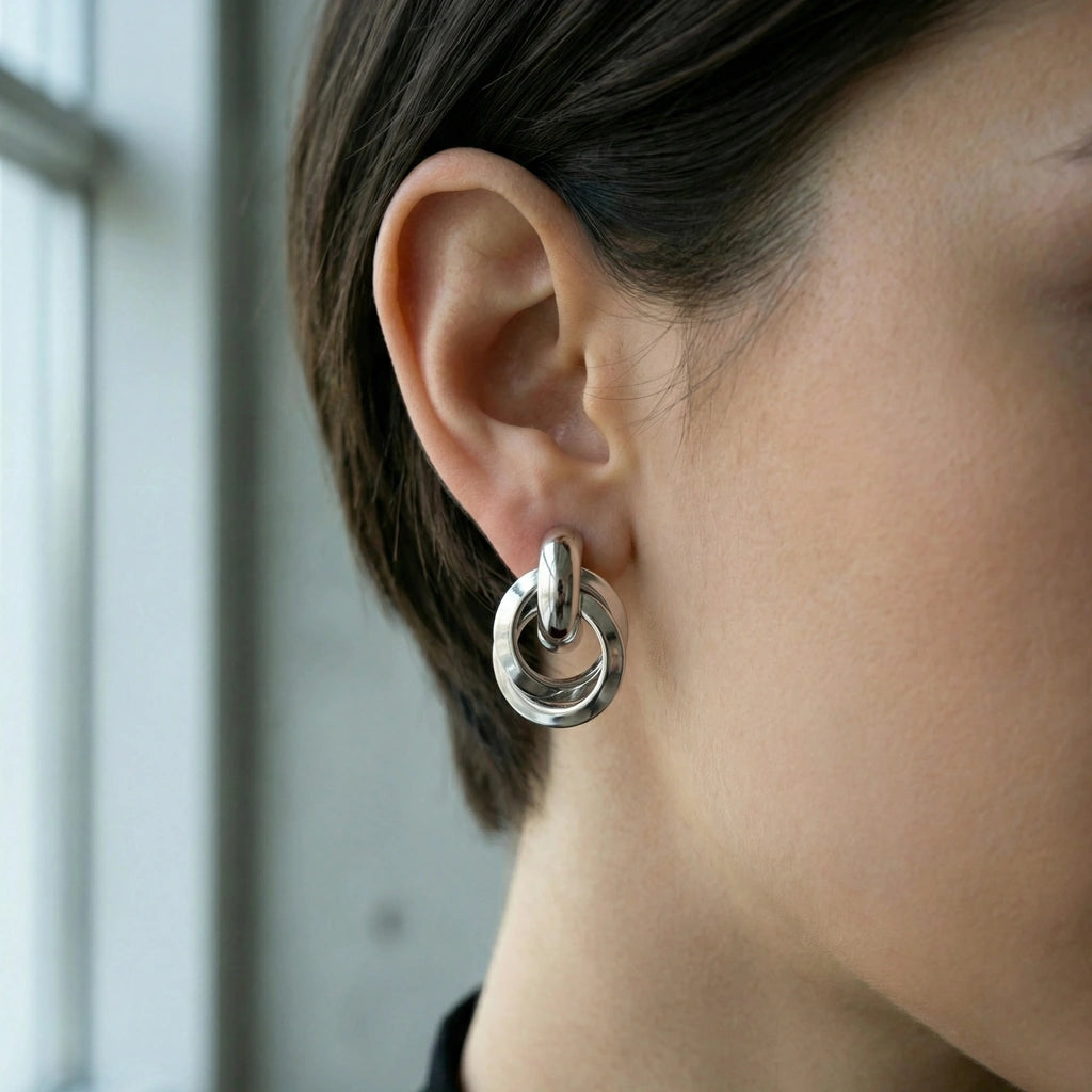 Stud Earrings - Interlock